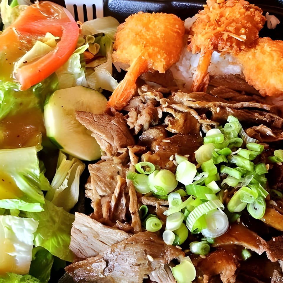 Ronin BBQ Teriyaki plate with beef, fried shrimp, rice, and a side salad.